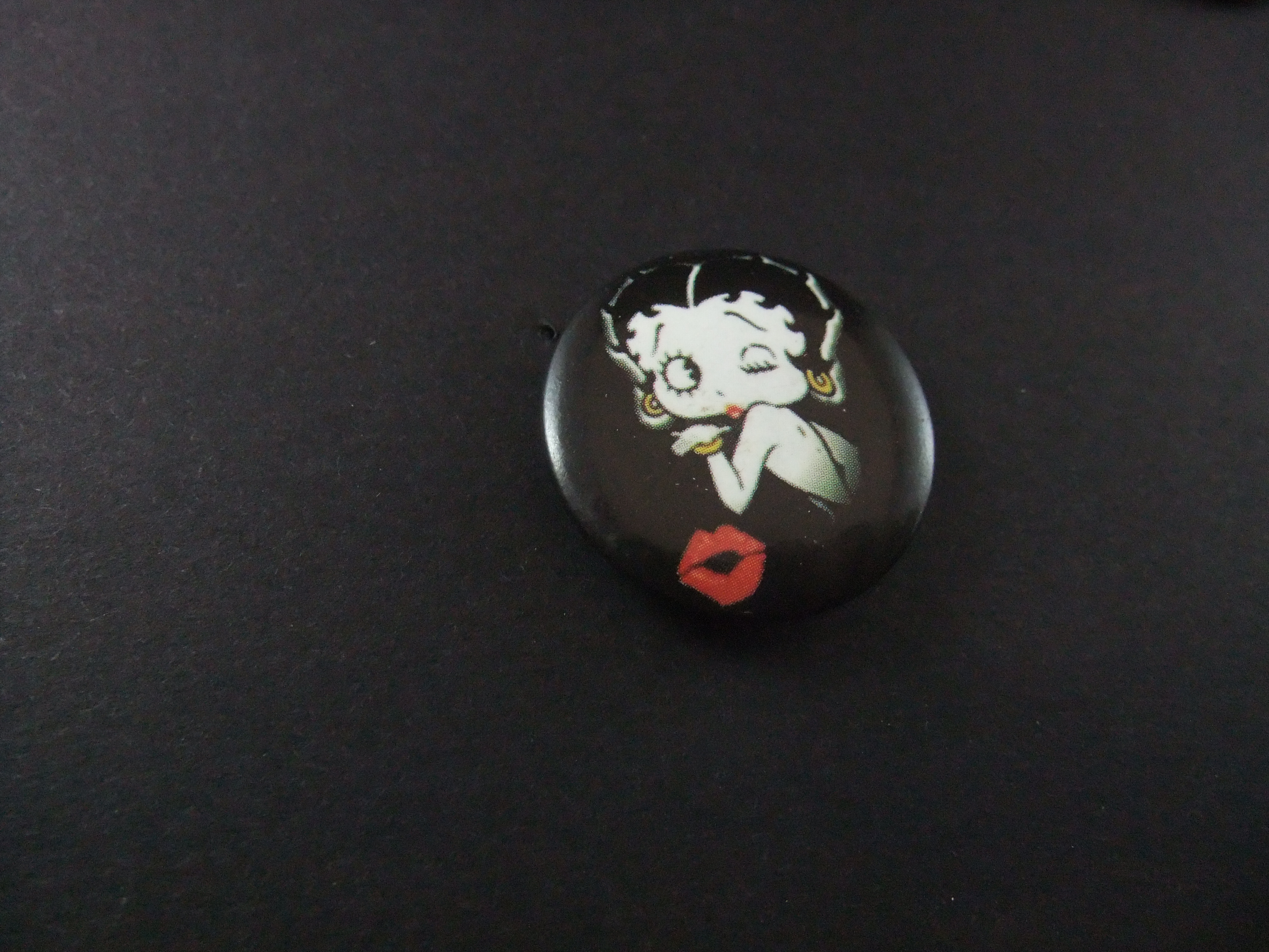 Betty Boop Amerikaans strip- en tekenfilmfiguur, zwart met rode lipstick